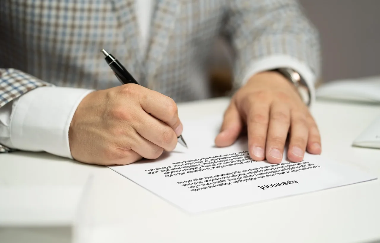 contract, agreement, signing a contract, document, signature, business deal, contract, contract, contract, contract, contract, agreement, signature, signature, signature, signature. Vetting a Content Promotion Agency Means Checking the Retainer Terms First