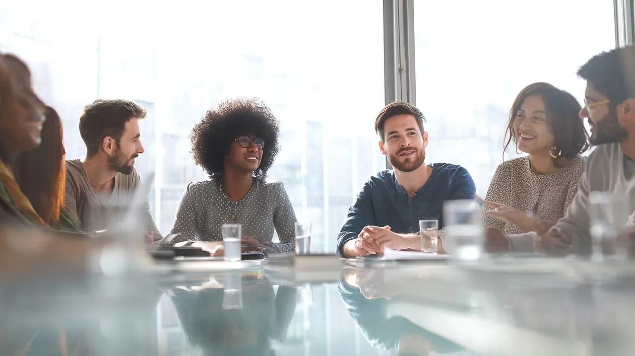 team, collaboration, meeting, business, professional, office, discussion, strategy, planning, communication, innovation, leadership, success, modern, workplace, growth opportunities, ideas, teamwork, initiative, development. Earning the Right to Amplify Comes Before Any Content Promotion Push