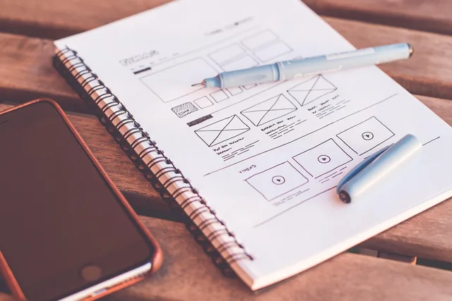 plans, design, web design, designer, desk, document, drawing, iphone, notebook, paper, pen, sketching, design, design, web design, web design, web design, web design, web design, designer. Proof Kits and Narrower Lists Define Content Promotion Trends for 2027